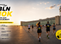 Läufer beim Saucony BLN 10K 2026 vor den Hangars des Flughafens Tempelhof